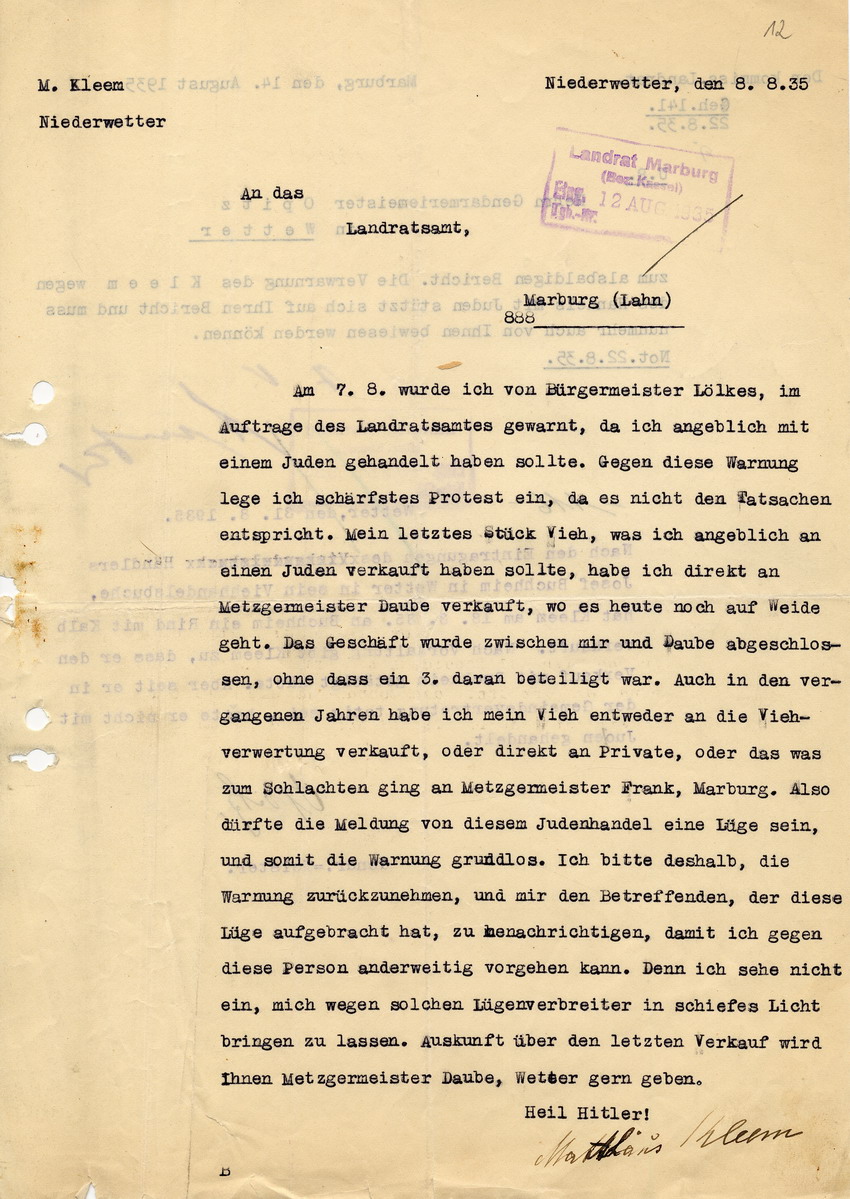 Schreiben von Matthias Kleem aus Niederwetter an das Landratsamt Marburg betreffend Protest gegen Warnung wegen angeblichen Viehhandels mit Juden, 8. August 1935.