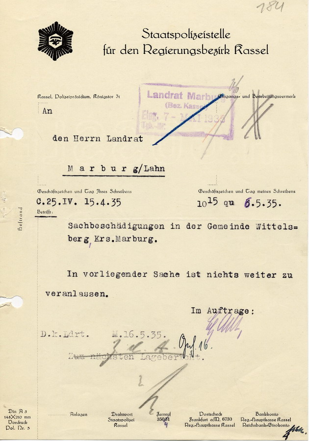 Schreiben der Staatspolizeistelle Kassel an den Landrat Marburg die Sachbeschädigung der Gemeinde Wittelsberg betreffend, 6. Mai 1935.
