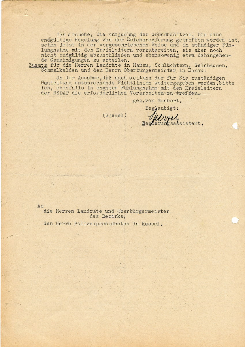 Regierungspräsident Kassel an die Landräte und Oberbürgermeister des Bezirks, sowie den Polizeipräsidenten betreffend die Entjudung des Grundbesitzes. Kassel, 03. Dezember 1938